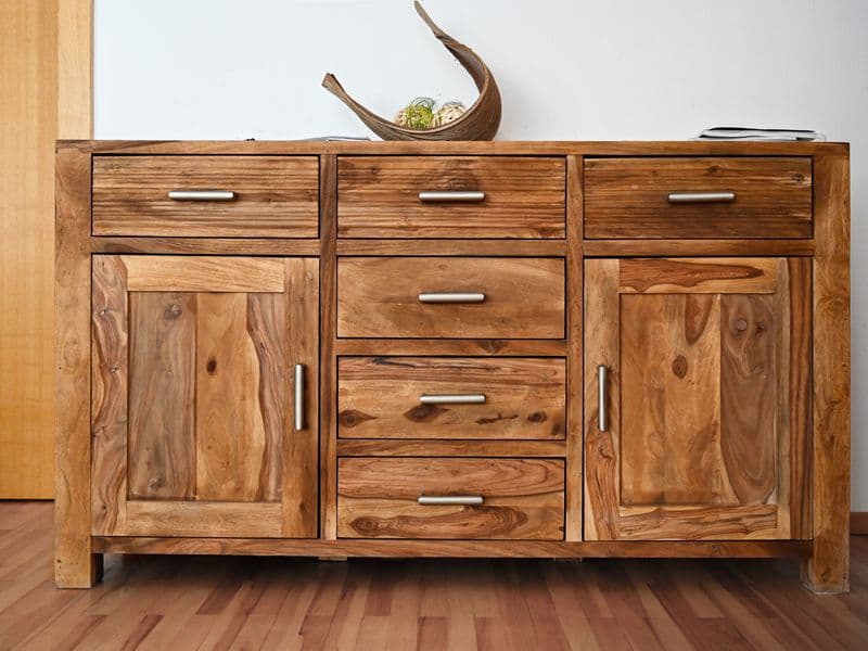 Wooden cabinet with steel drawer and door handles